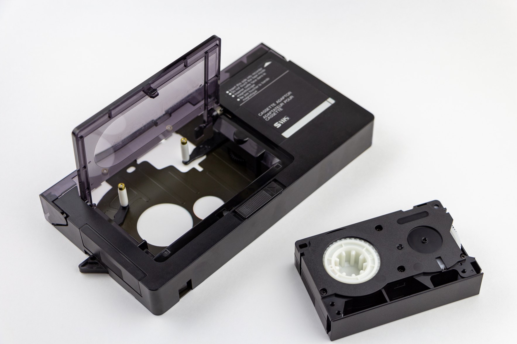 What is an adapter for a Video Home System Compact (VHSC) tape?